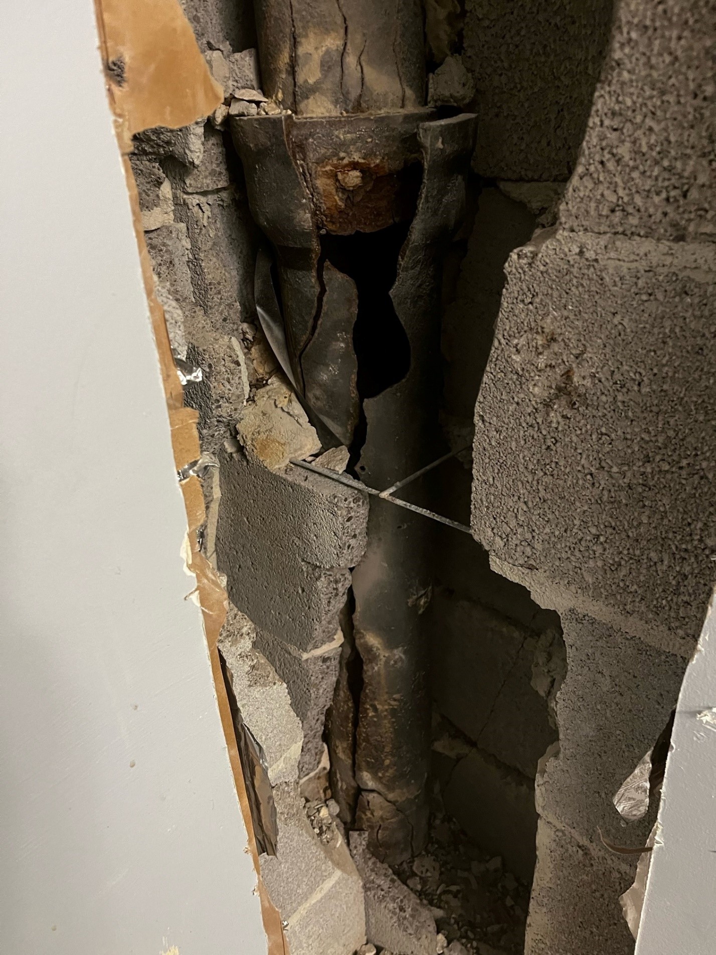 vertical-stack-pipe-failure-in-wall-masonry